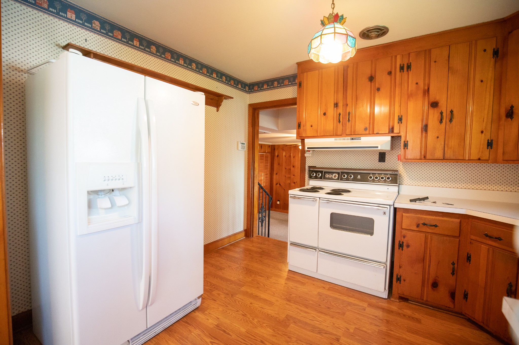 407 School Pass Madison, TN 37115 - Photo 6 of 15 a kitchen with a stove a sink and a refrigerator
