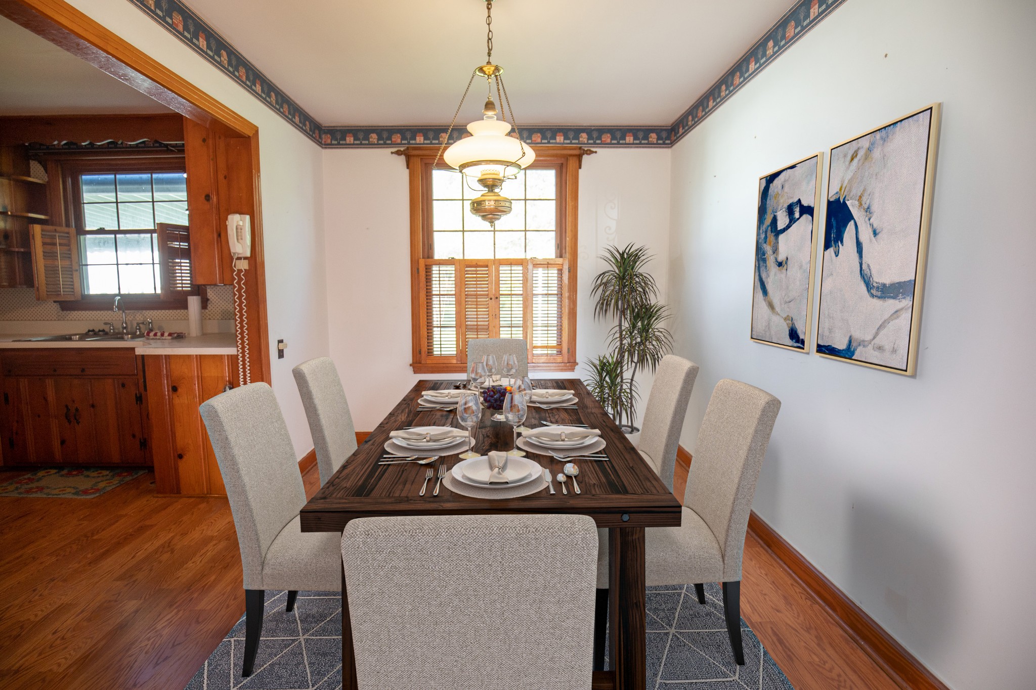407 School Pass Madison, TN 37115 - Photo 7 of 15 a view of a dining room with furniture window and wooden floor