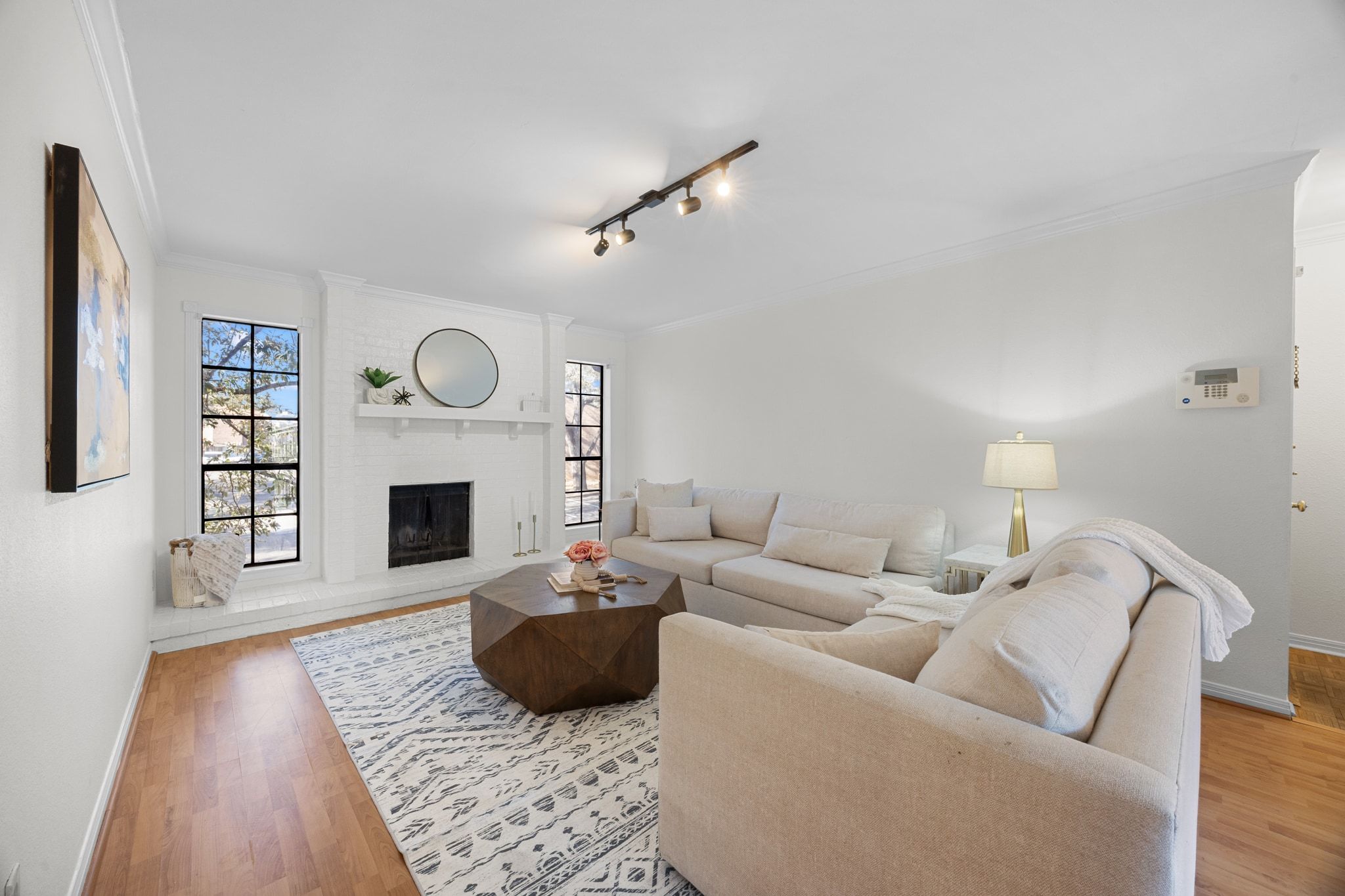 4159 Steck Avenue, Unit 258 Austin, TX 78759 - Photo 2 of 28 a living room with furniture a rug and a fireplace