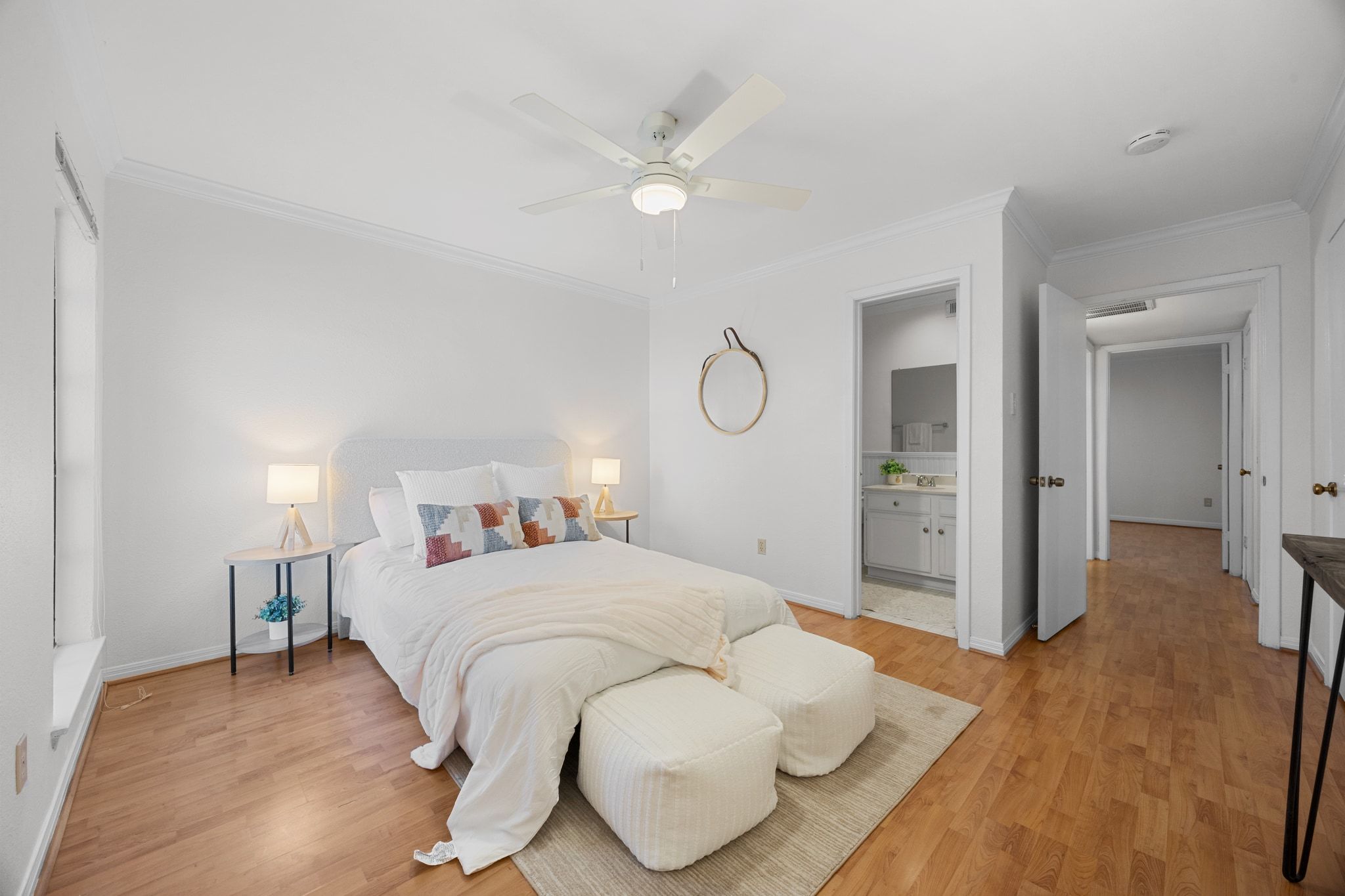 4159 Steck Avenue, Unit 258 Austin, TX 78759 - Photo 3 of 28 a bedroom with a bed and closet with wooden floor