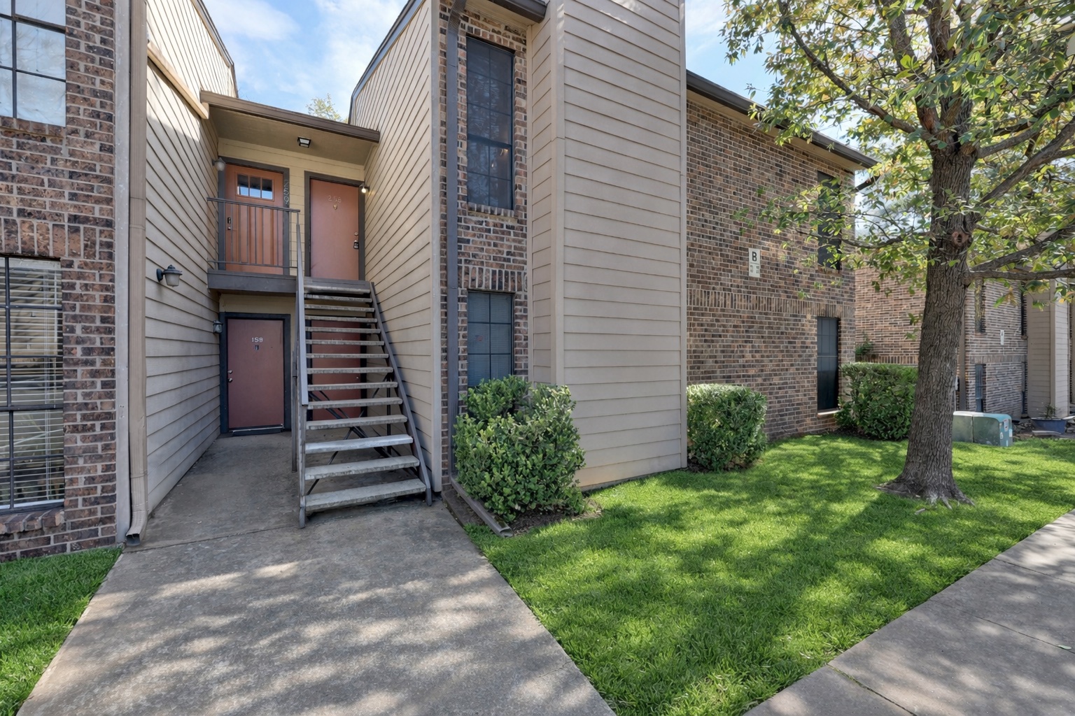 4159 Steck Avenue, Unit 258 Austin, TX 78759 - Photo 6 of 28 a view of a back yard of the house