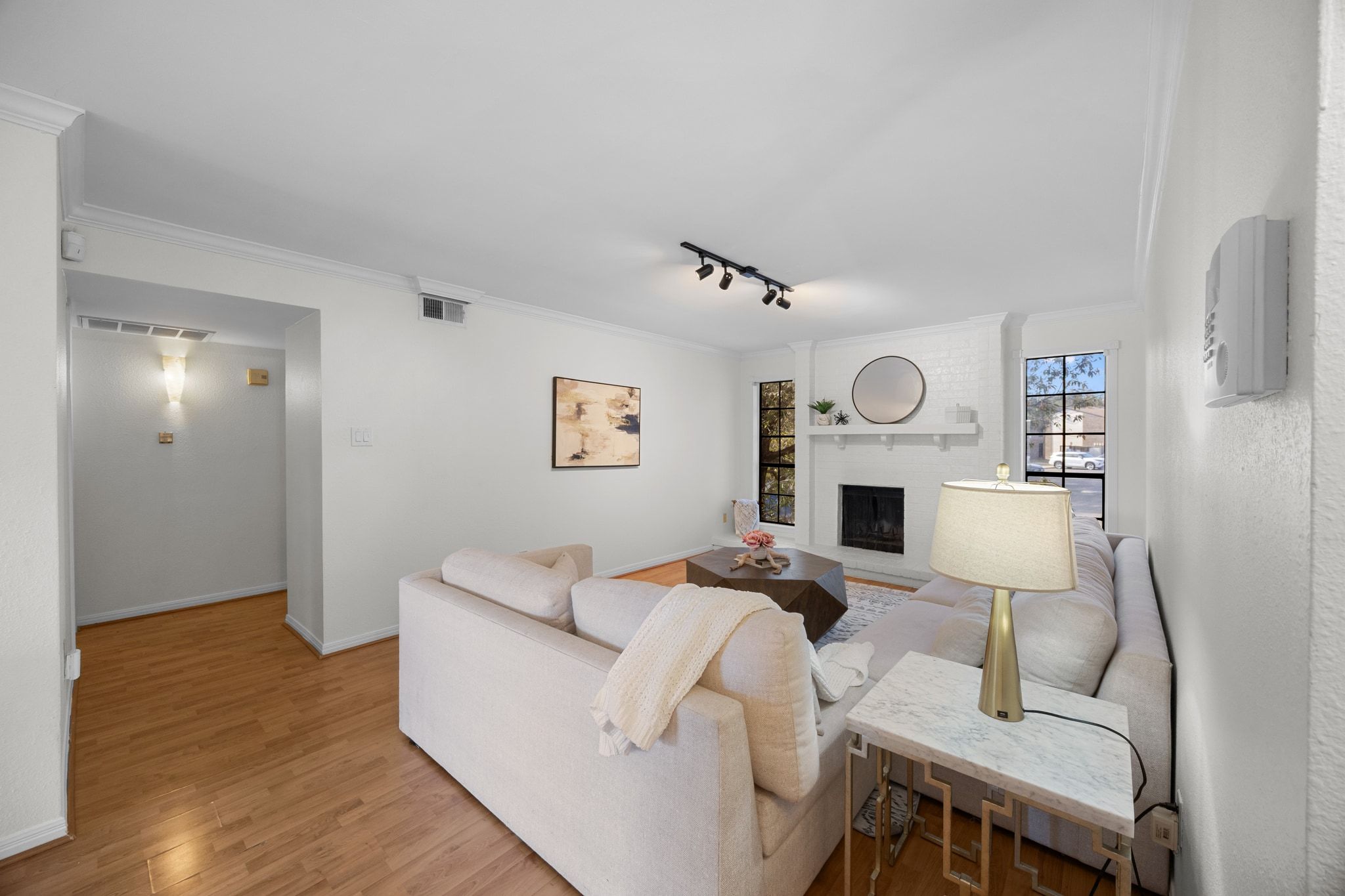 4159 Steck Avenue, Unit 258 Austin, TX 78759 - Photo 7 of 28 a living room with furniture and a fireplace