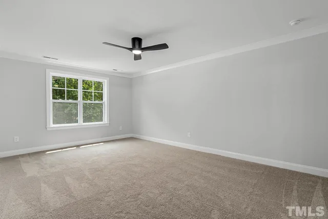 a view of a hallway with closet and bathroom