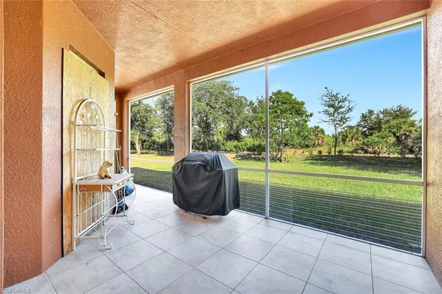 a view of a patio with a backyard