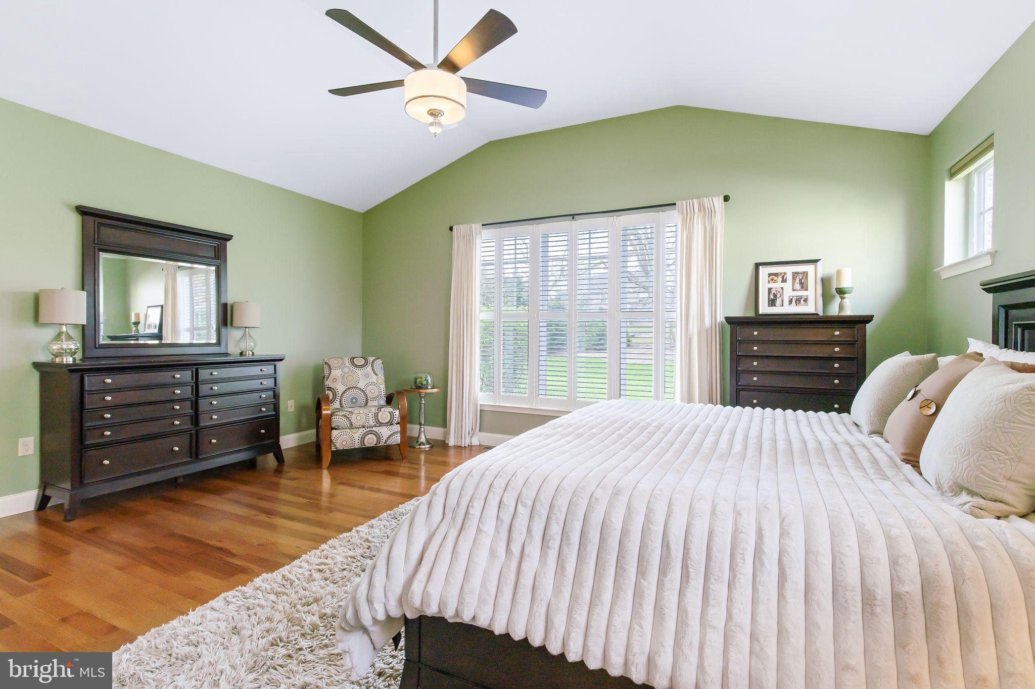 641 Dorset Street Lititz, PA 17543 - Photo 26 of 48 a bedroom with a bed and wooden floor