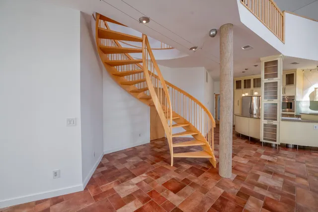a view of a livingroom with wooden floor