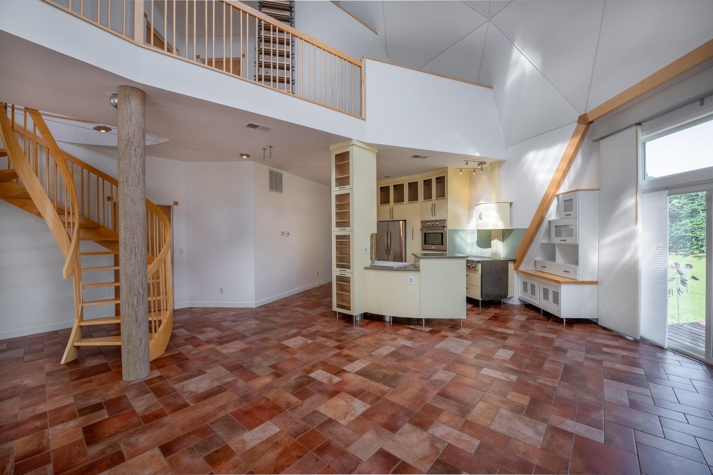4745 Plank Road Natural Bridge, VA 24578 - Photo 20 of 75 a view of a livingroom with wooden floor and stairs