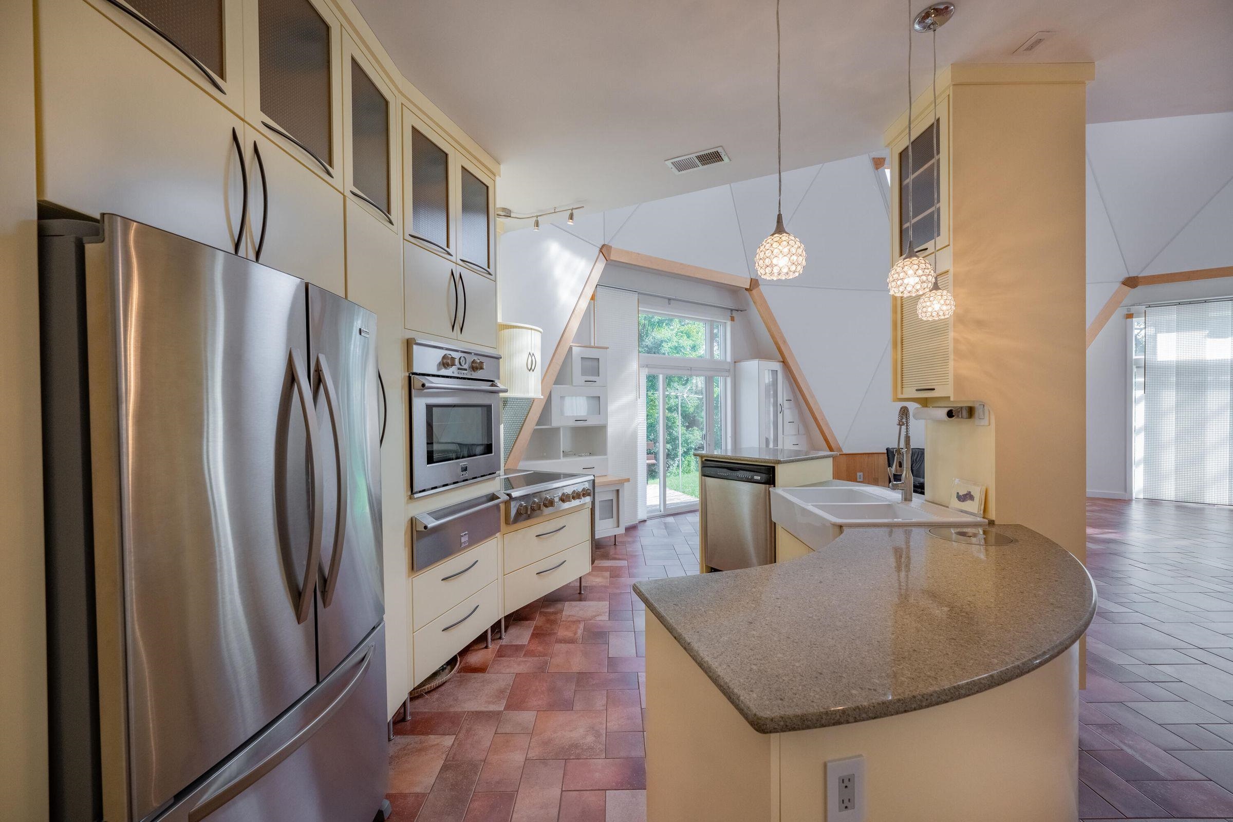 4745 Plank Road Natural Bridge, VA 24578 - Photo 27 of 75 a kitchen with stainless steel appliances granite countertop a refrigerator a sink a stove and white cabinets
