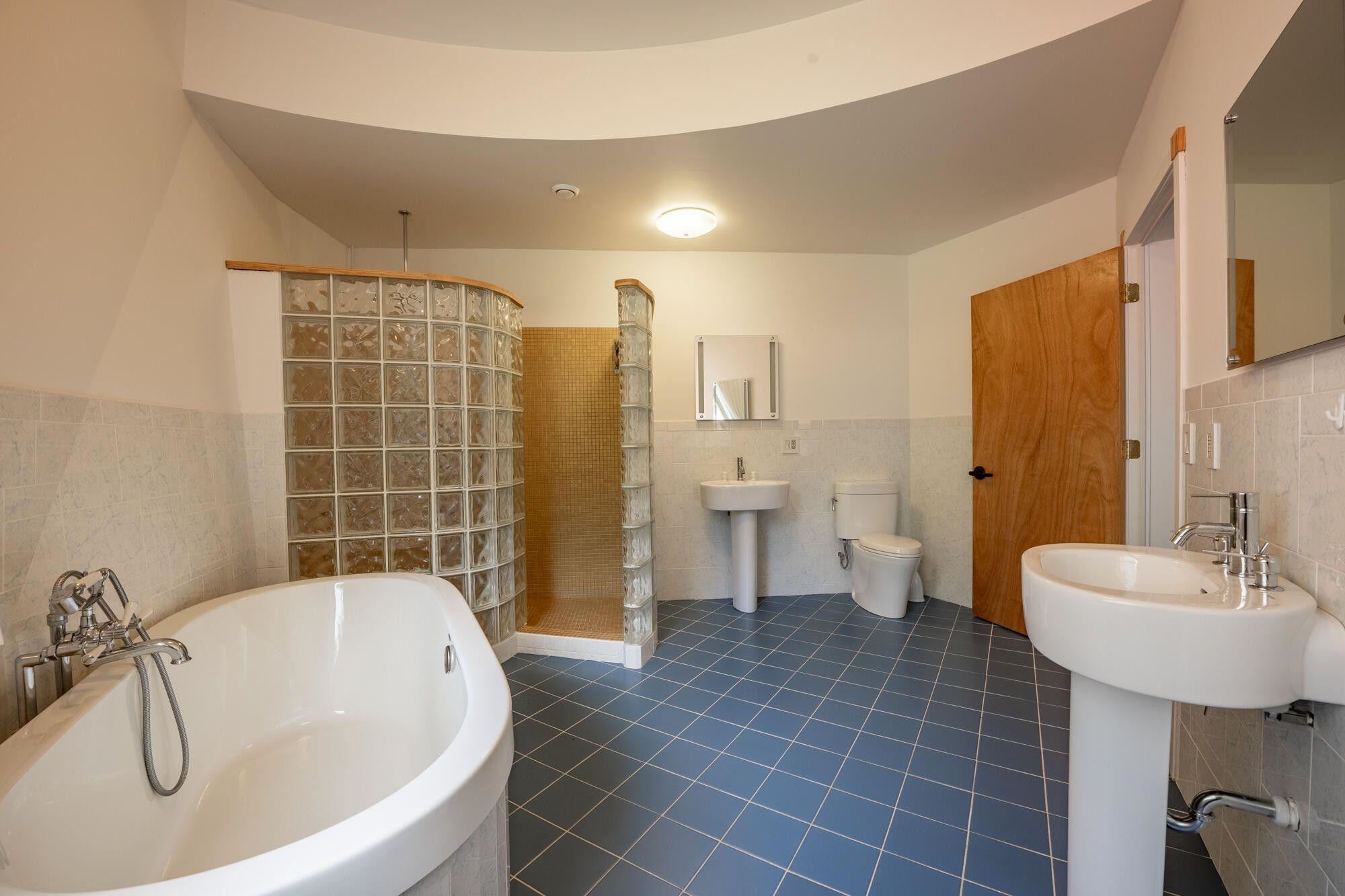4745 Plank Road Natural Bridge, VA 24578 - Photo 40 of 75 a bathroom with a sink a toilet and bathtub