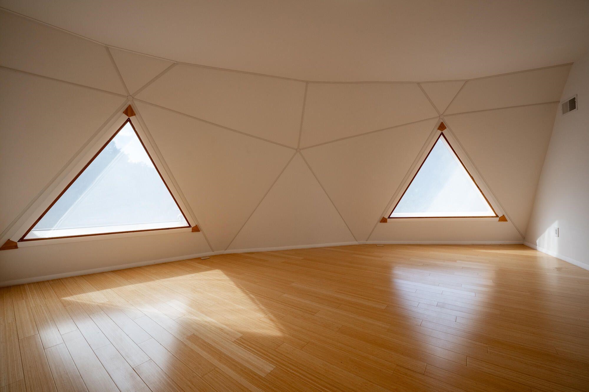 4745 Plank Road Natural Bridge, VA 24578 - Photo 45 of 75 an empty room with wooden floor and windows