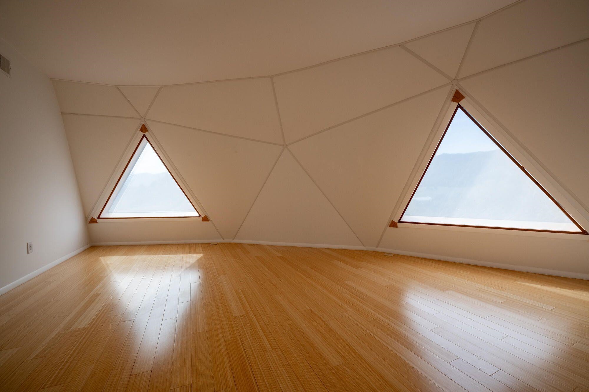 4745 Plank Road Natural Bridge, VA 24578 - Photo 46 of 75 an empty room with wooden floor and windows