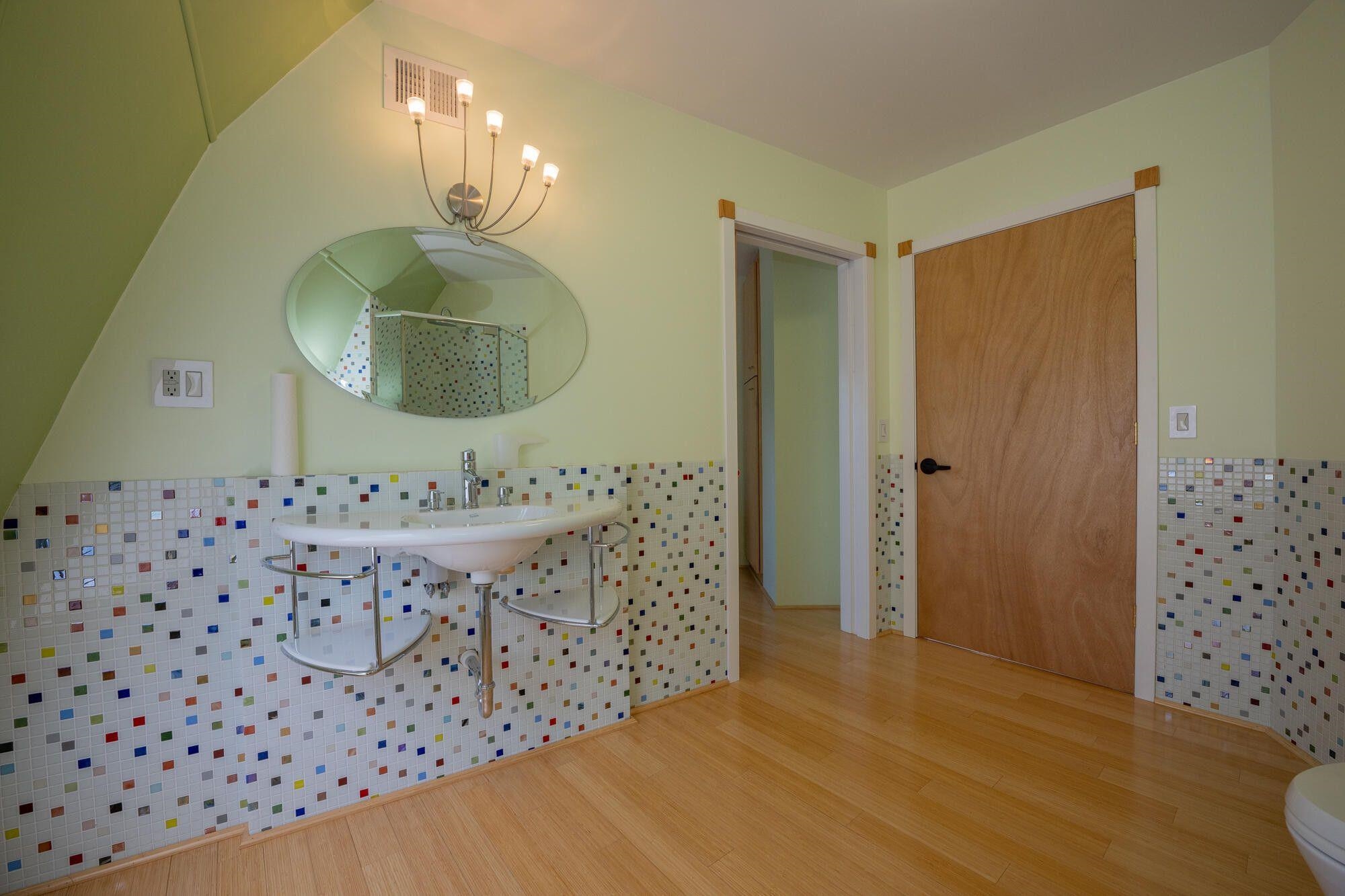 4745 Plank Road Natural Bridge, VA 24578 - Photo 49 of 75 a bathroom with a double vanity sink mirror and shower
