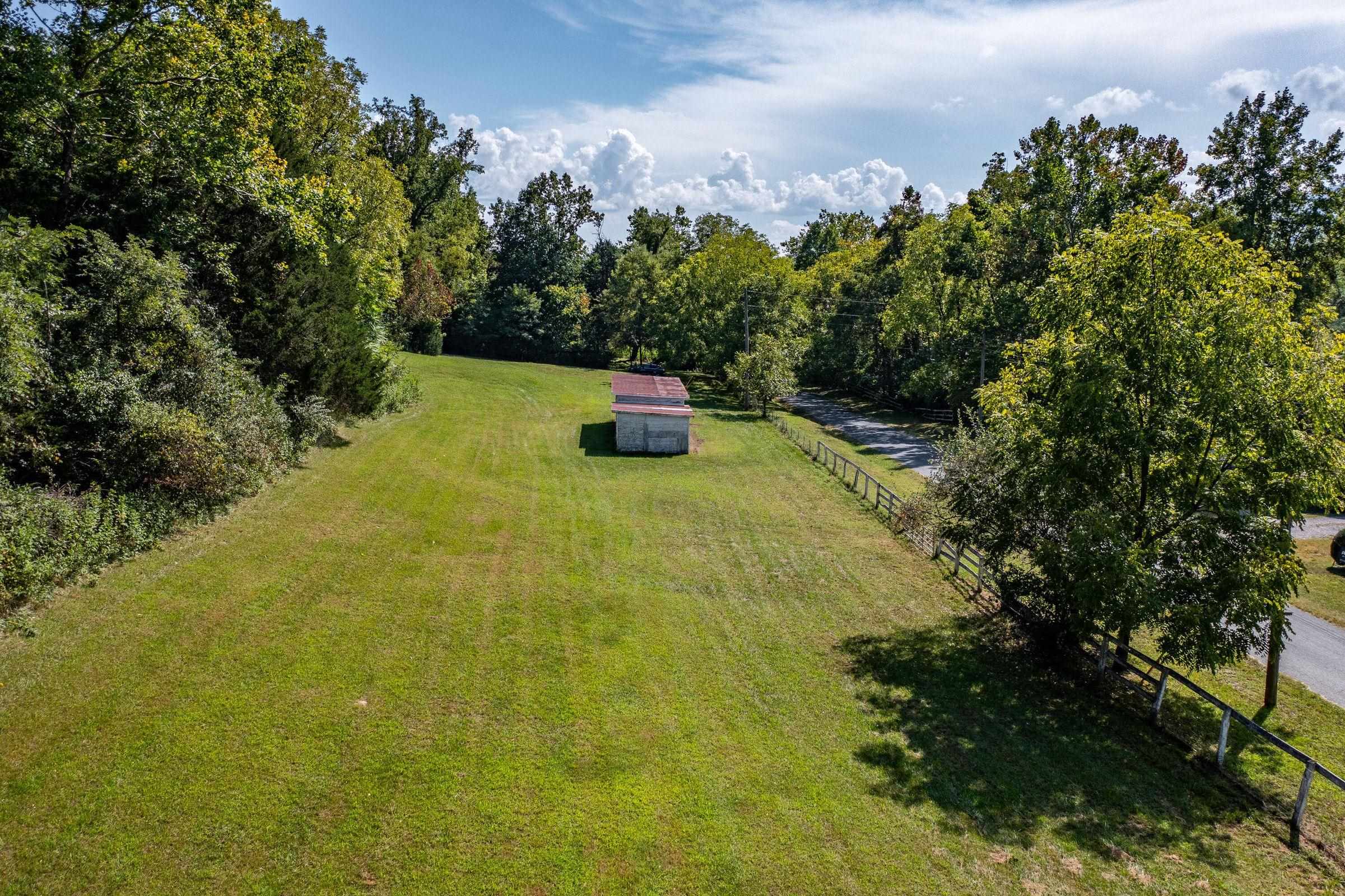 4745 Plank Road Natural Bridge, VA 24578 - Photo 64 of 75 a view of a big yard with large trees