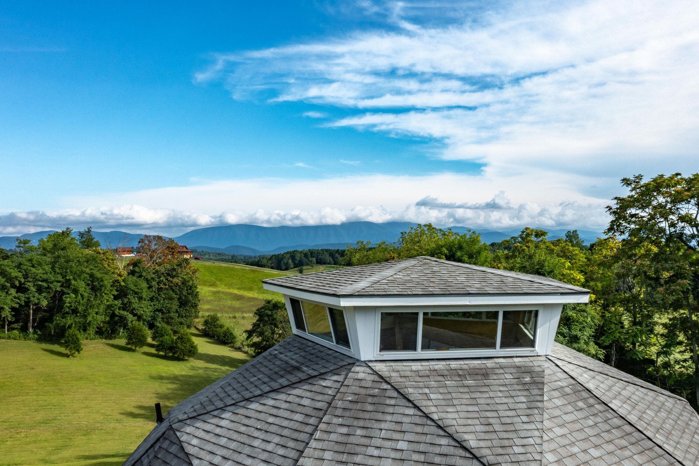 4745 Plank Road Natural Bridge, VA 24578 - Photo 69 of 75 a view of a house with a yard