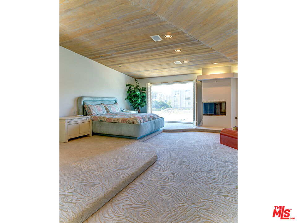 4611 Roma Court Marina del Rey, CA 90292 - Photo 13 of 26 a living room with furniture and a large window