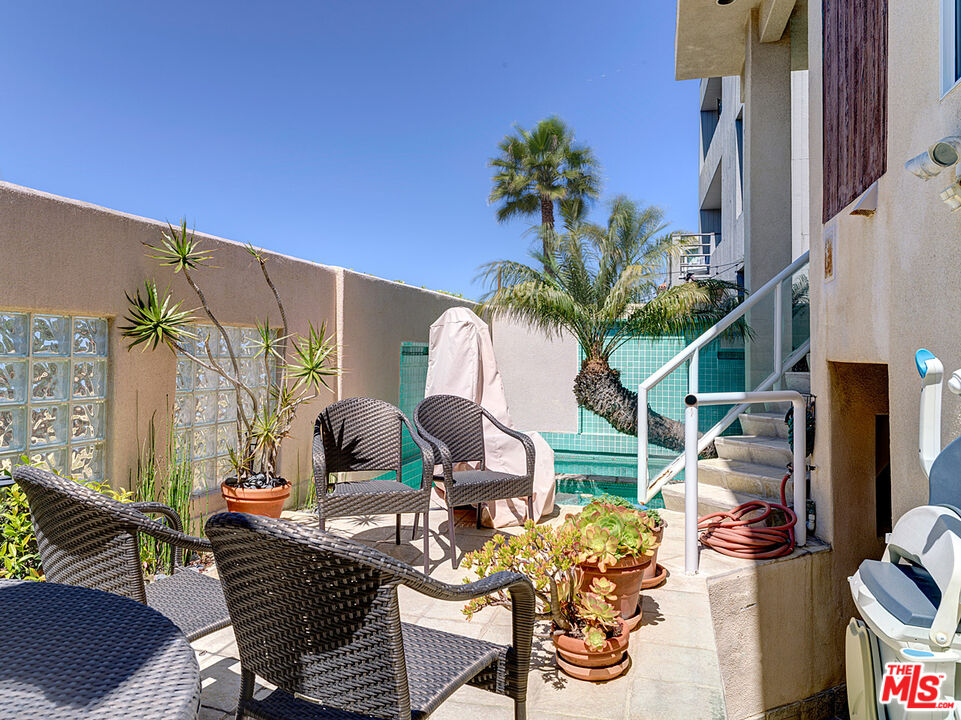 4611 Roma Court Marina del Rey, CA 90292 - Photo 22 of 26 a front view of house with yard outdoor seating and barbeque oven