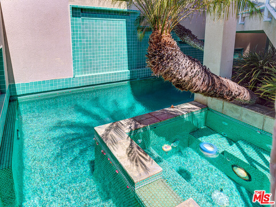 4611 Roma Court Marina del Rey, CA 90292 - Photo 23 of 26 a view of a backyard with a garden