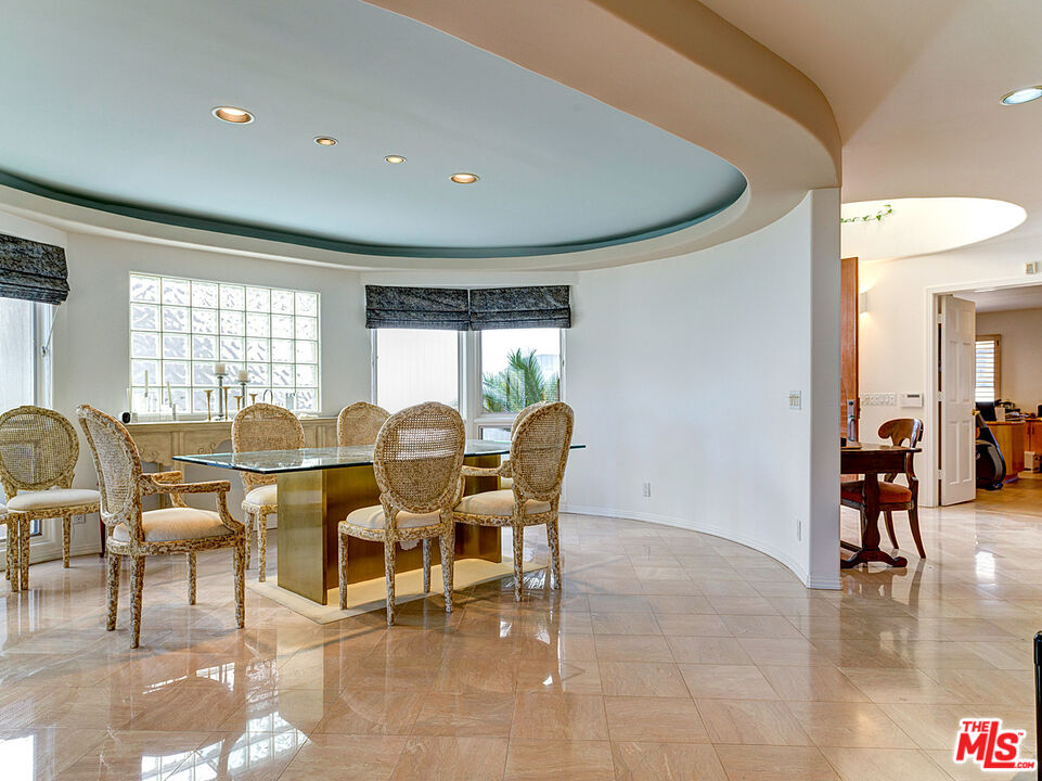 4611 Roma Court Marina del Rey, CA 90292 - Photo 4 of 26 a dining room with furniture and wooden floor