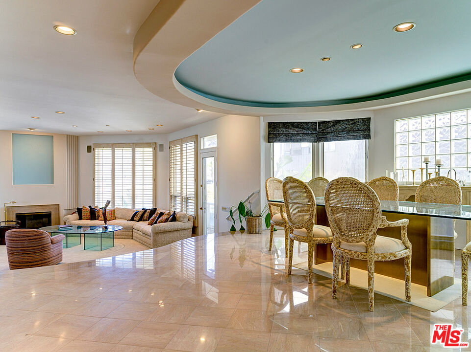 4611 Roma Court Marina del Rey, CA 90292 - Photo 5 of 26 a living room with lots of furniture and a large window