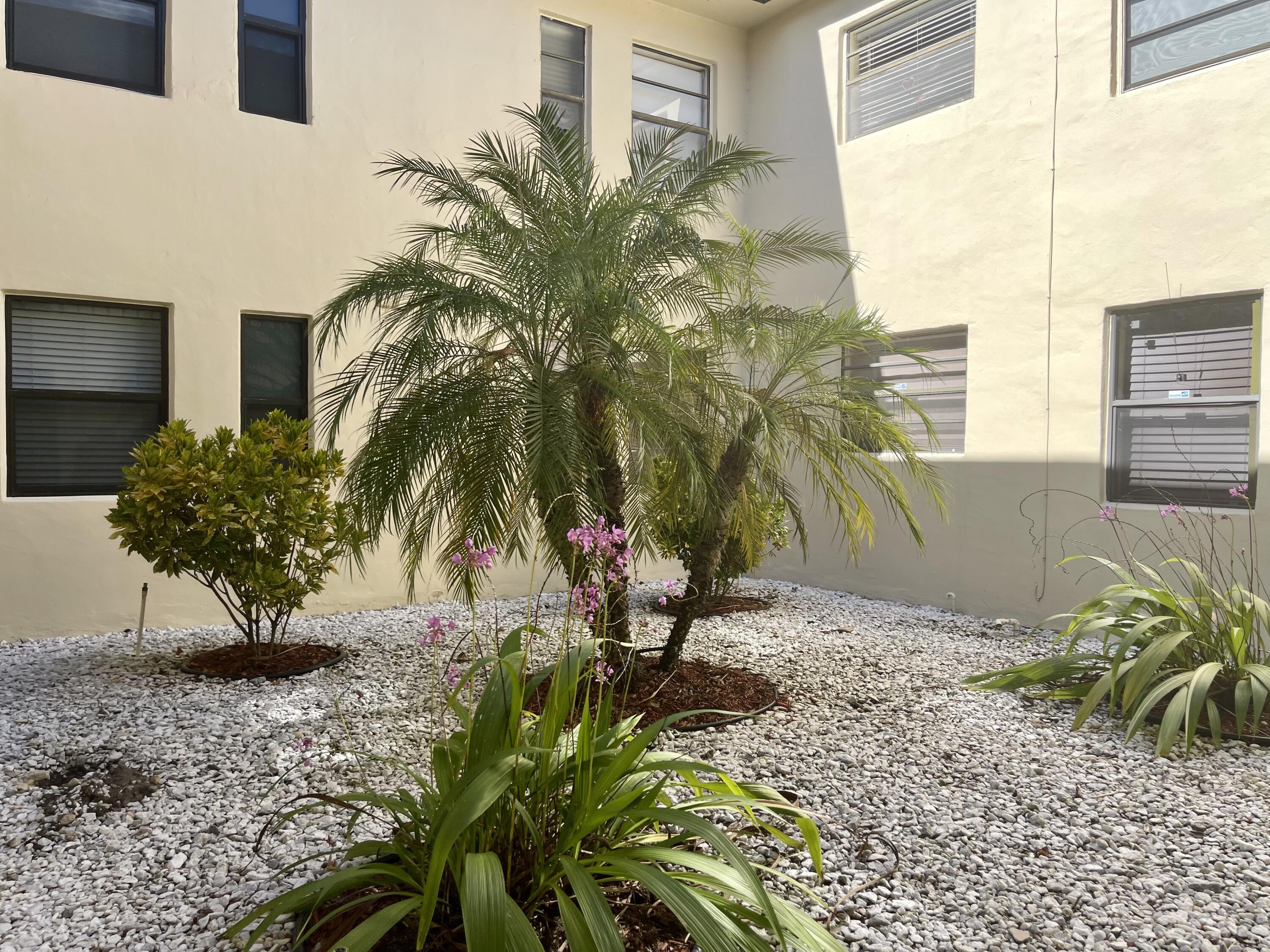 73 Capri B, Unit 73 Delray Beach, FL 33484 - Photo 52 of 93 Building atrium