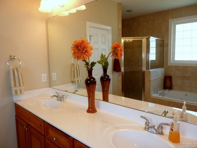This Luxurious Master Bath features an Exceptionally Large Ceramic Tile shower, Jetted Garden Tub and Double Vanity. Master Bath/Spa
