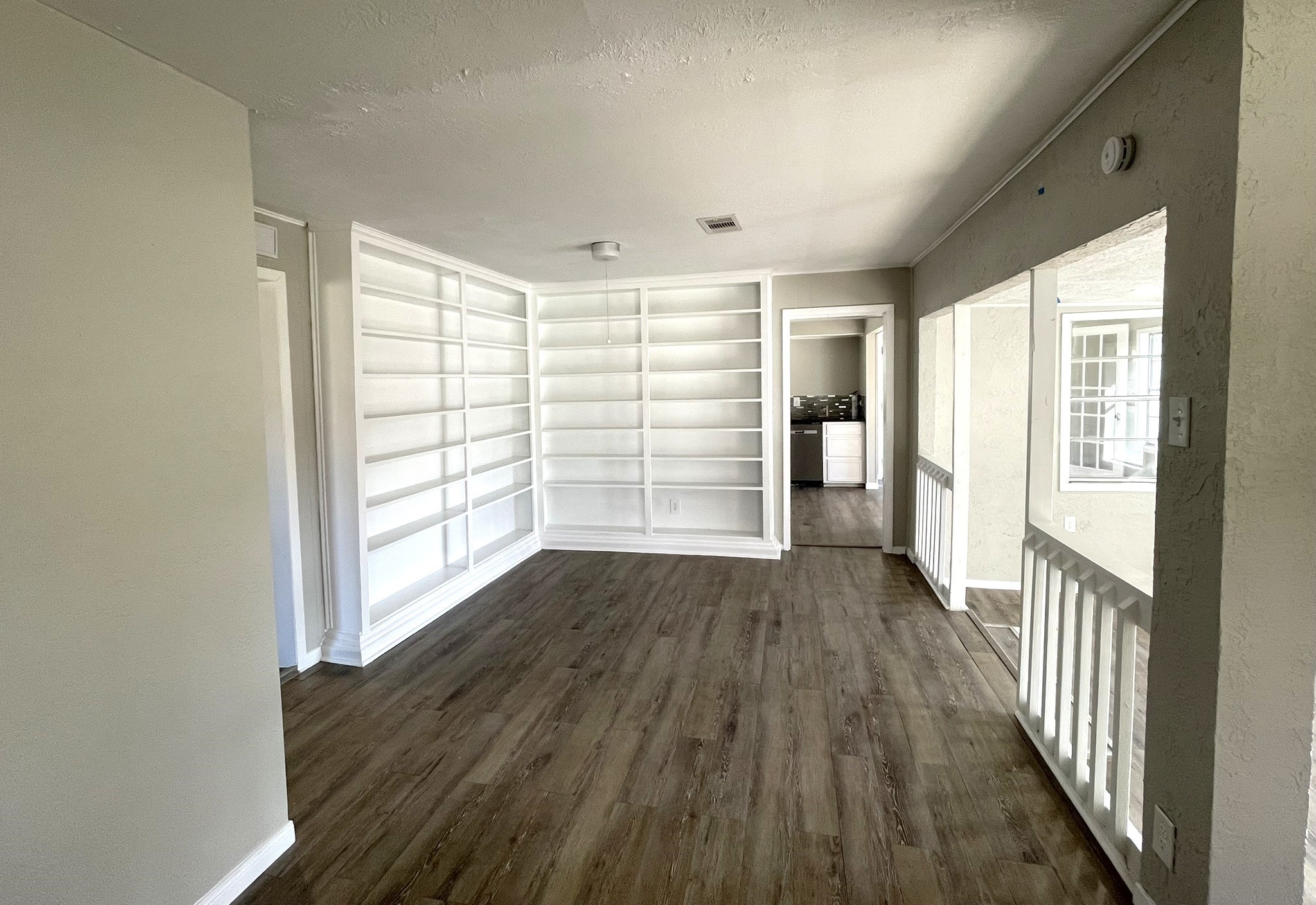104 County Road 2401 Hull, TX 77564 - Photo 14 of 43 Dining area with built-in bookshelves