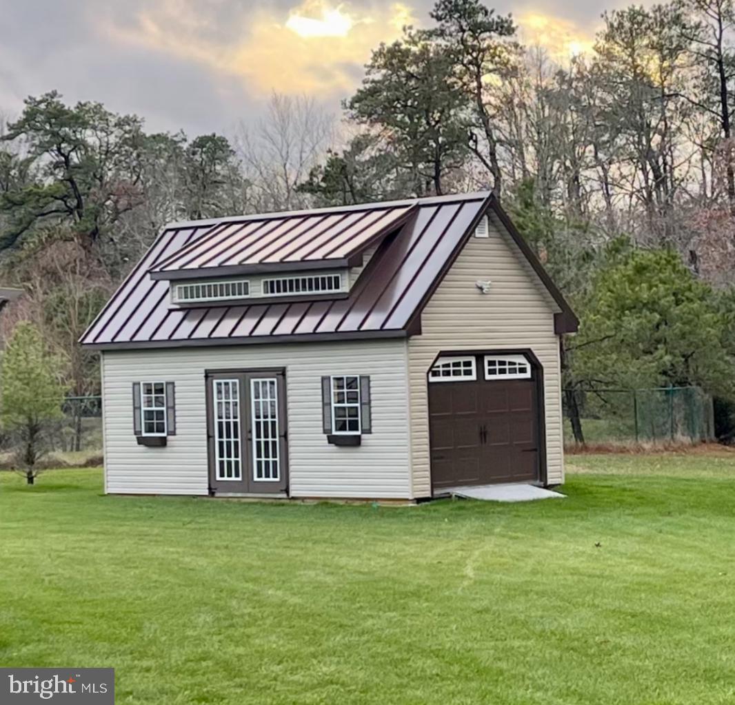 211 Ripley Court Williamstown, NJ 08094 - Photo 2 of 2 a front view of house with yard and trees in the background