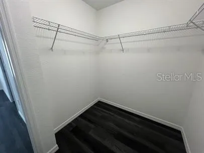 a view of a room with racks on the wall