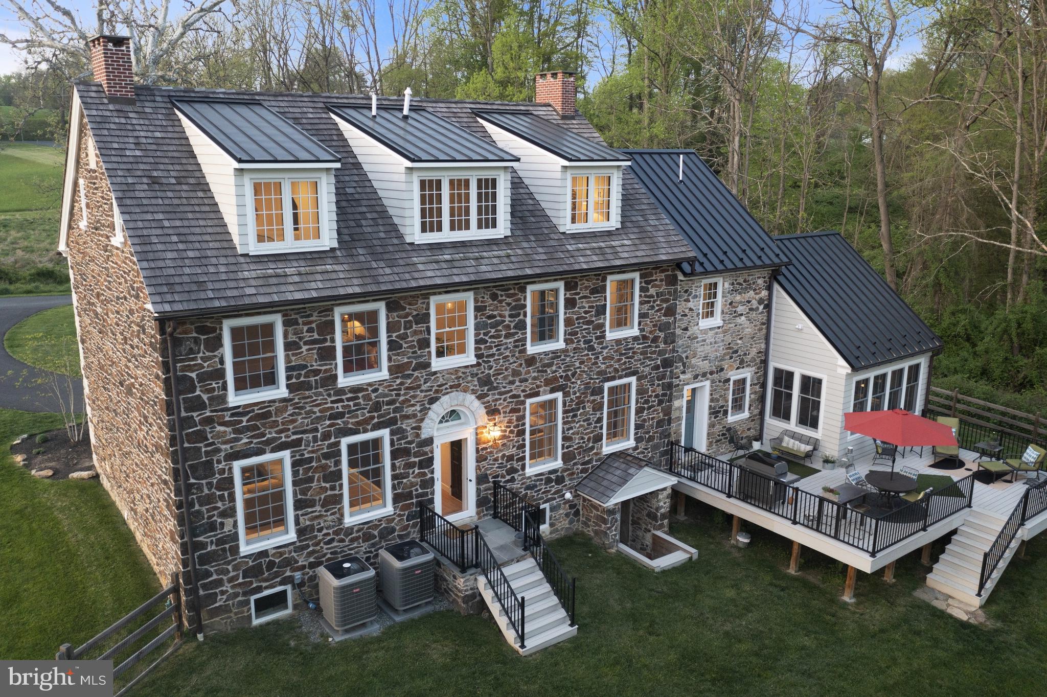 1250 Hillendale Road Chadds Ford, PA 19317 - Photo 56 of 76 a front view of a house with garden