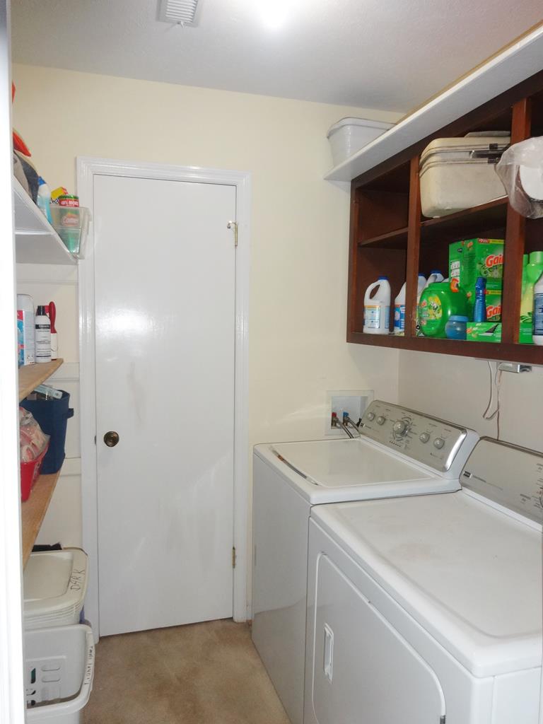 2525 Norris Road, Unit 113 Columbus, GA 31907 - Photo 21 of 40 a utility room with dryer and washer
