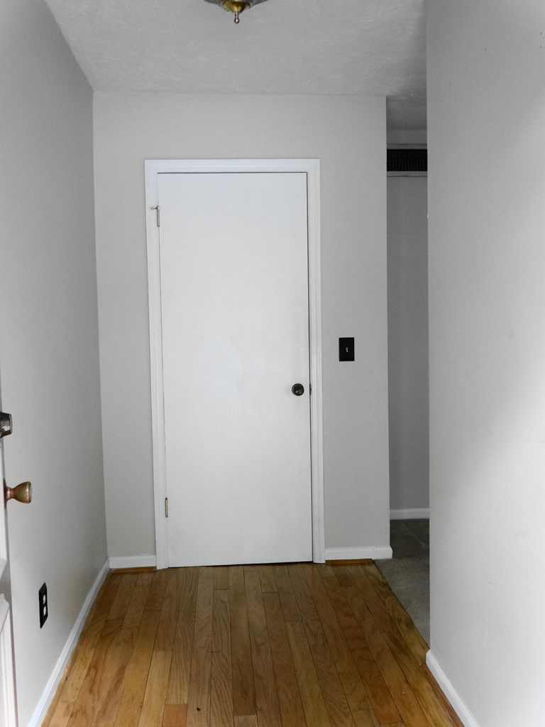 2525 Norris Road, Unit 113 Columbus, GA 31907 - Photo 10 of 40 a view of a room with wooden floor and a sink