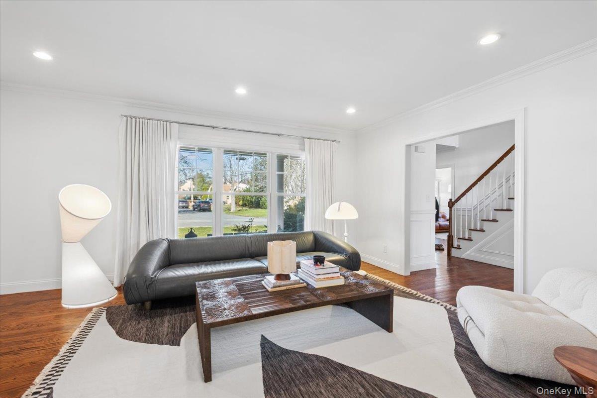 73 Atherstone Road Scarsdale, NY 10583 - Photo 12 of 34 a living room with furniture and a large window