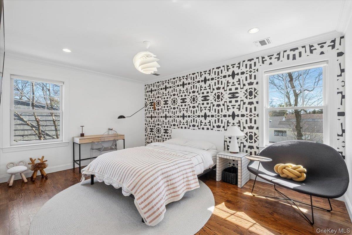 73 Atherstone Road Scarsdale, NY 10583 - Photo 18 of 34 a bedroom with a bed and a couch