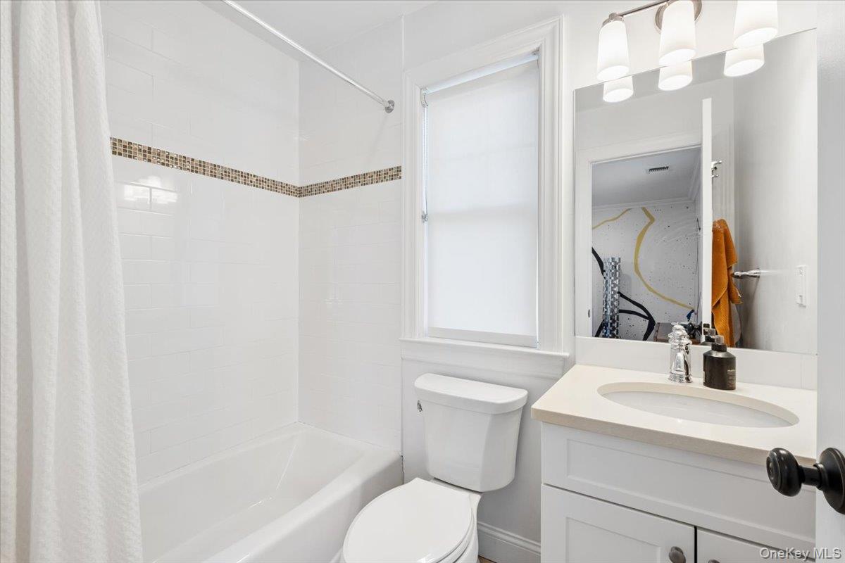 73 Atherstone Road Scarsdale, NY 10583 - Photo 21 of 34 a bathroom with a sink toilet and shower