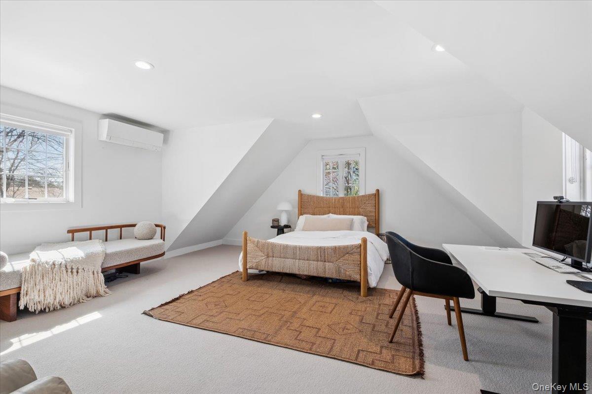 73 Atherstone Road Scarsdale, NY 10583 - Photo 22 of 34 a living room with furniture and painting on the wall