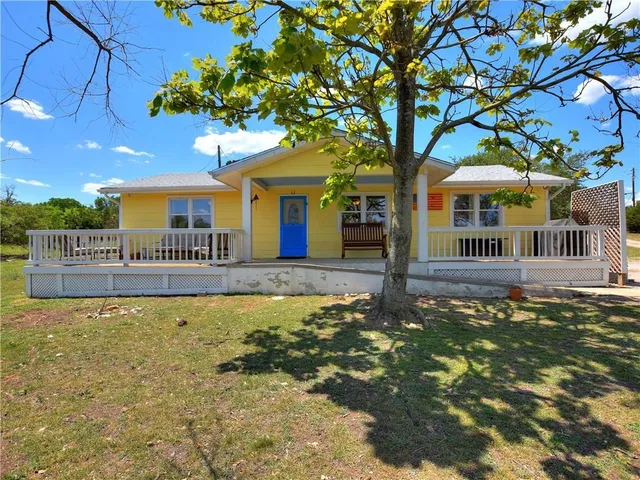 a view of backyard with green space