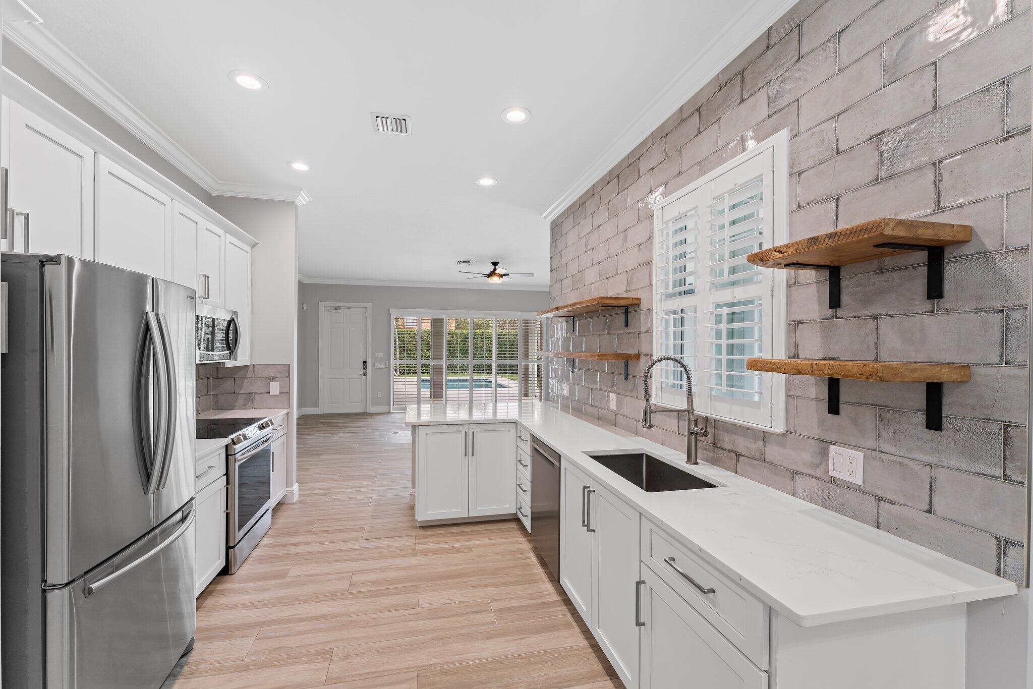 243 Caravelle Drive Jupiter, FL 33458 - Photo 18 of 100 036-243CaravelleDr-Jupiter-FL-SMALL