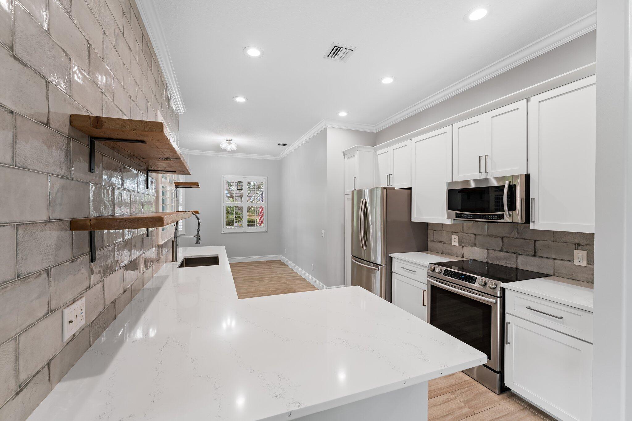 243 Caravelle Drive Jupiter, FL 33458 - Photo 19 of 100 033-243CaravelleDr-Jupiter-FL-SMALL