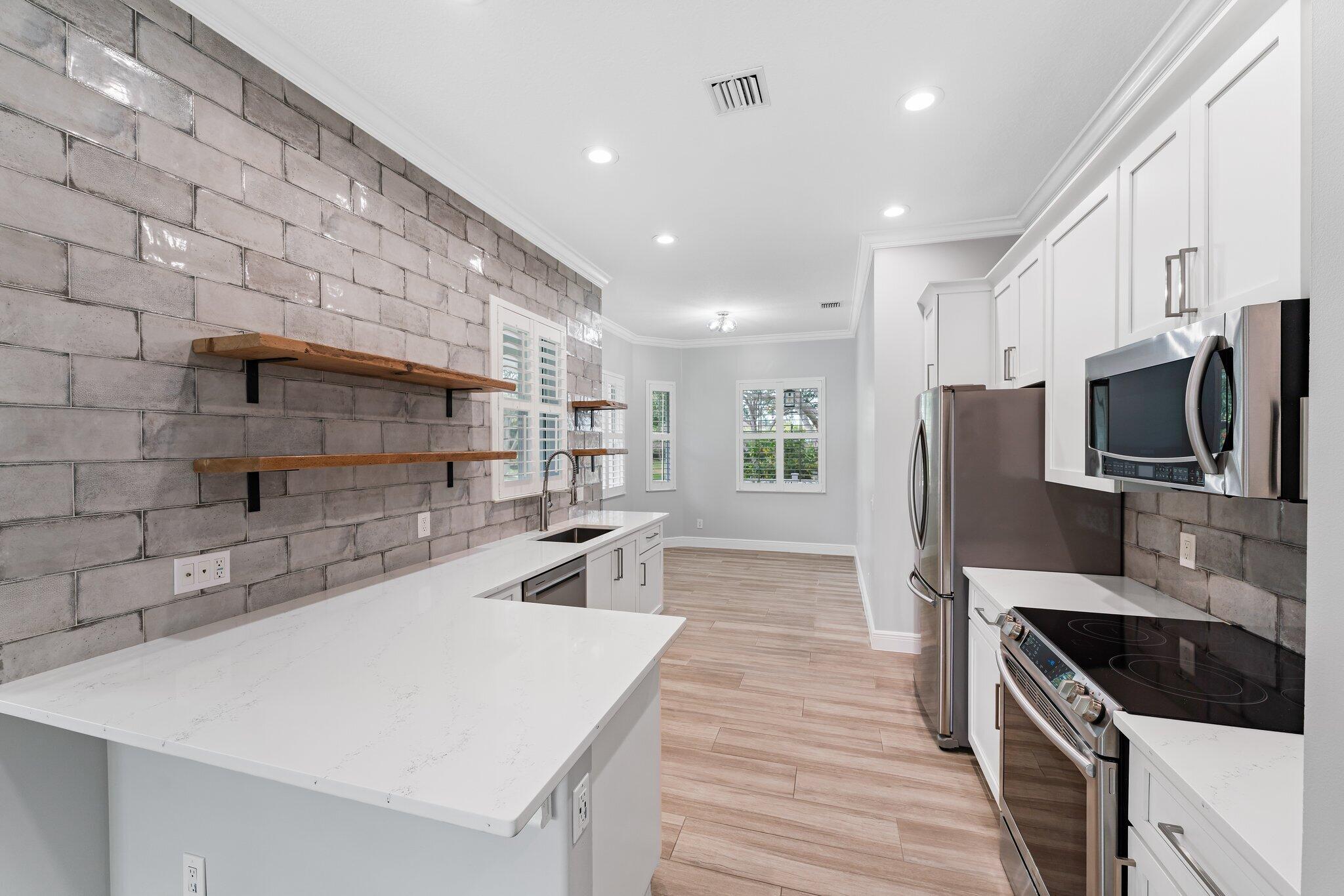 243 Caravelle Drive Jupiter, FL 33458 - Photo 25 of 100 032-243CaravelleDr-Jupiter-FL-SMALL