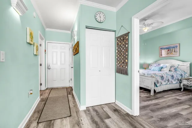 a bedroom with a bed and a view of bathroom