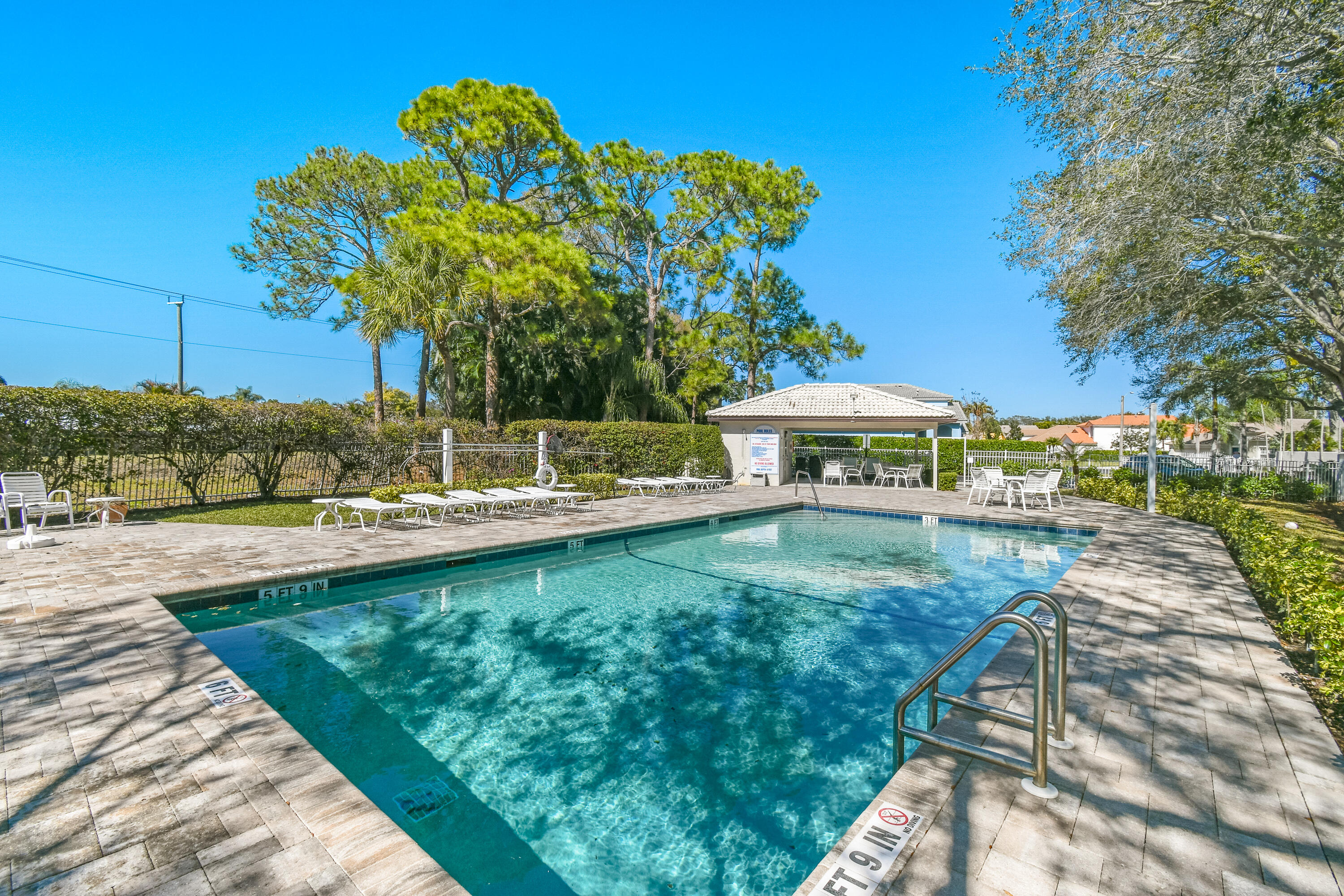 163 Spoonbill Court Jupiter, FL 33458 - Photo 58 of 67 a view of a garden with a slide