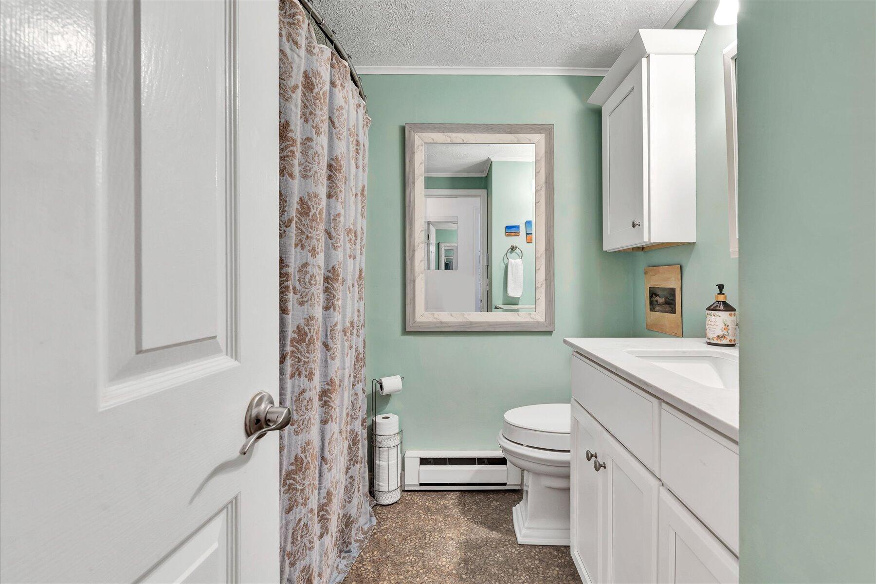 78 Highview Drive Sandwich, MA 02563 - Photo 11 of 20 a bathroom with a sink a toilet and a mirror