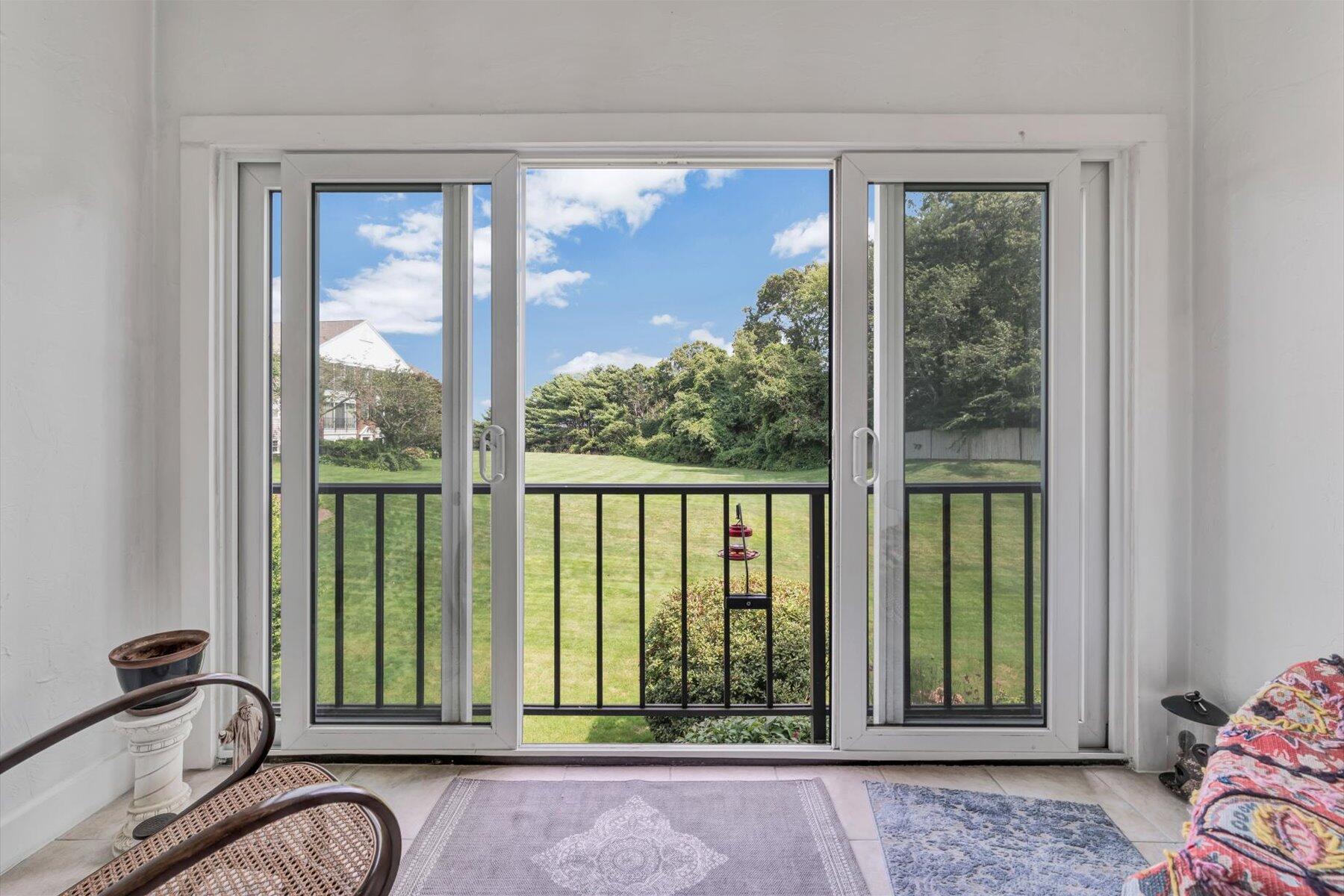 78 Highview Drive Sandwich, MA 02563 - Photo 15 of 20 a view of a livingroom with furniture and floor to ceiling window