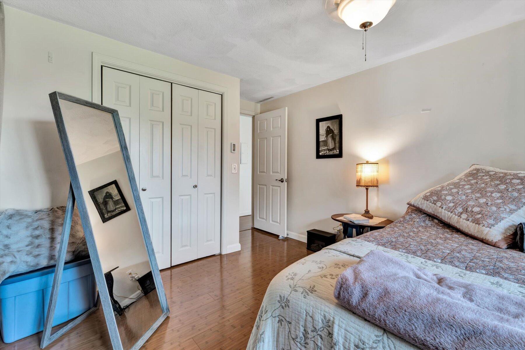 78 Highview Drive Sandwich, MA 02563 - Photo 10 of 20 a bed room with a bed and a lamp