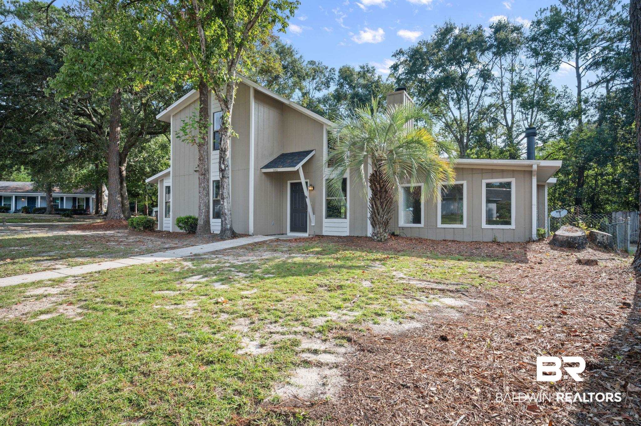 3701 Vista Ridge Drive Mobile, AL 36693 - Photo 2 of 33 View of front facade featuring a front yard