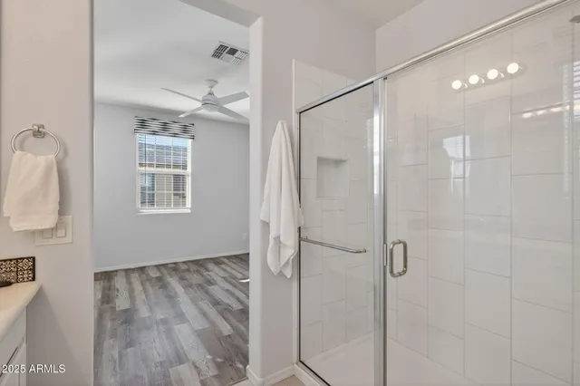 a kitchen with stainless steel appliances a stove a microwave a sink and cabinets