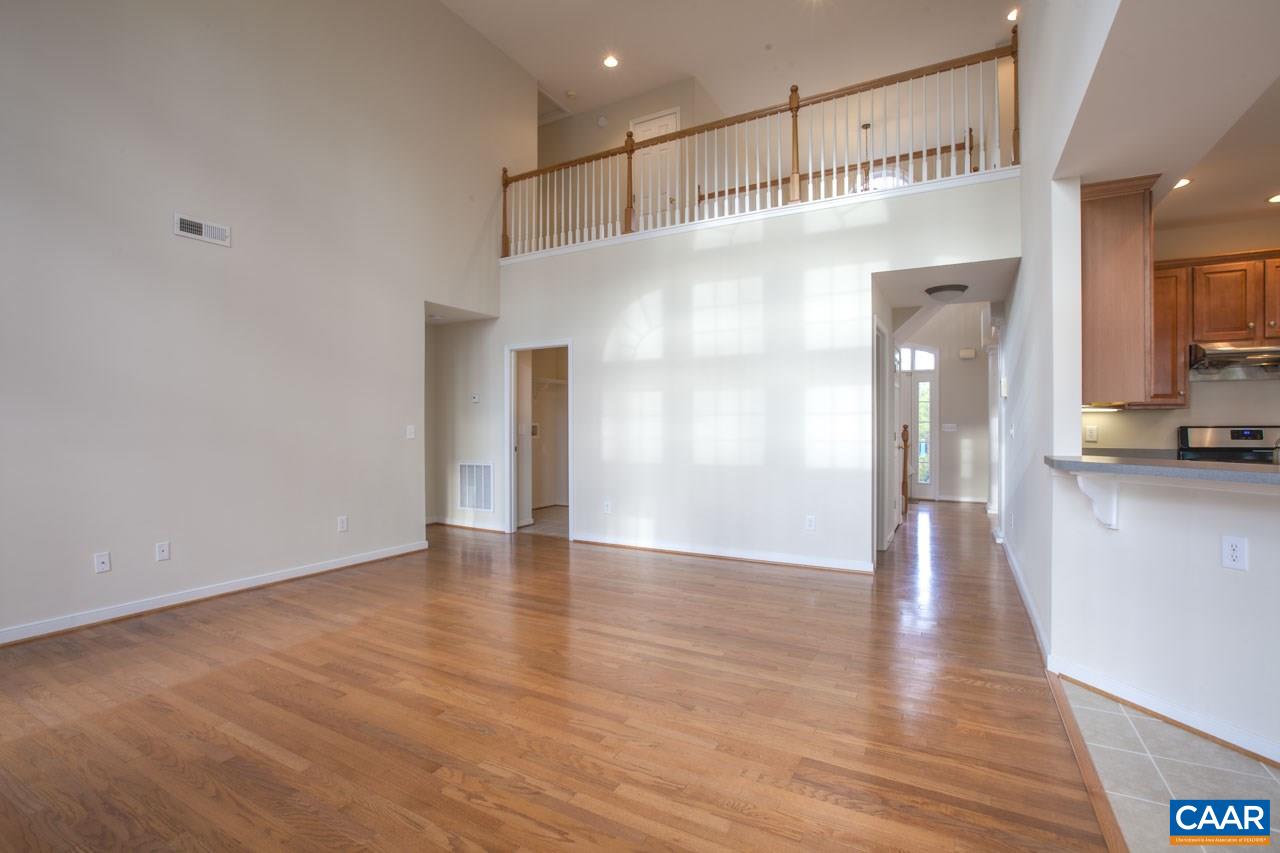 1981 Ridgetop Drive Charlottesville, VA 22903 - Photo 13 of 40 a view of a hallway with wooden floor