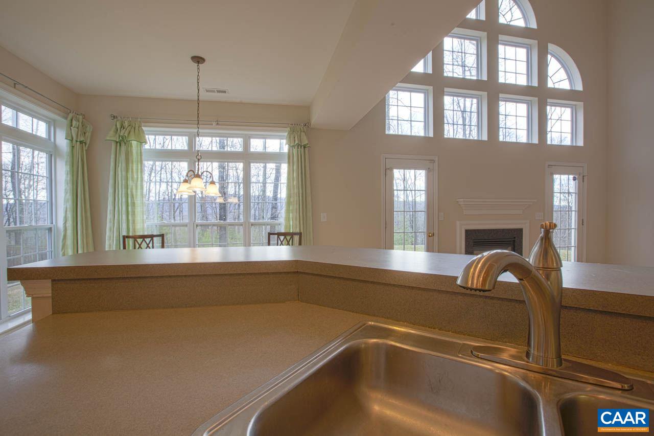 1981 Ridgetop Drive Charlottesville, VA 22903 - Photo 18 of 40 a view of a kitchen with a tub and windows