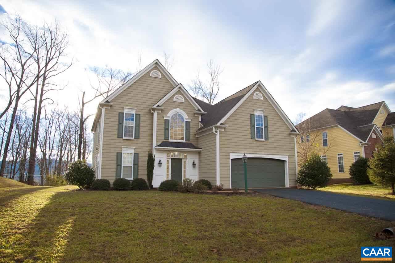 1981 Ridgetop Drive Charlottesville, VA 22903 - Photo 2 of 40 a front view of a house with a yard and garage