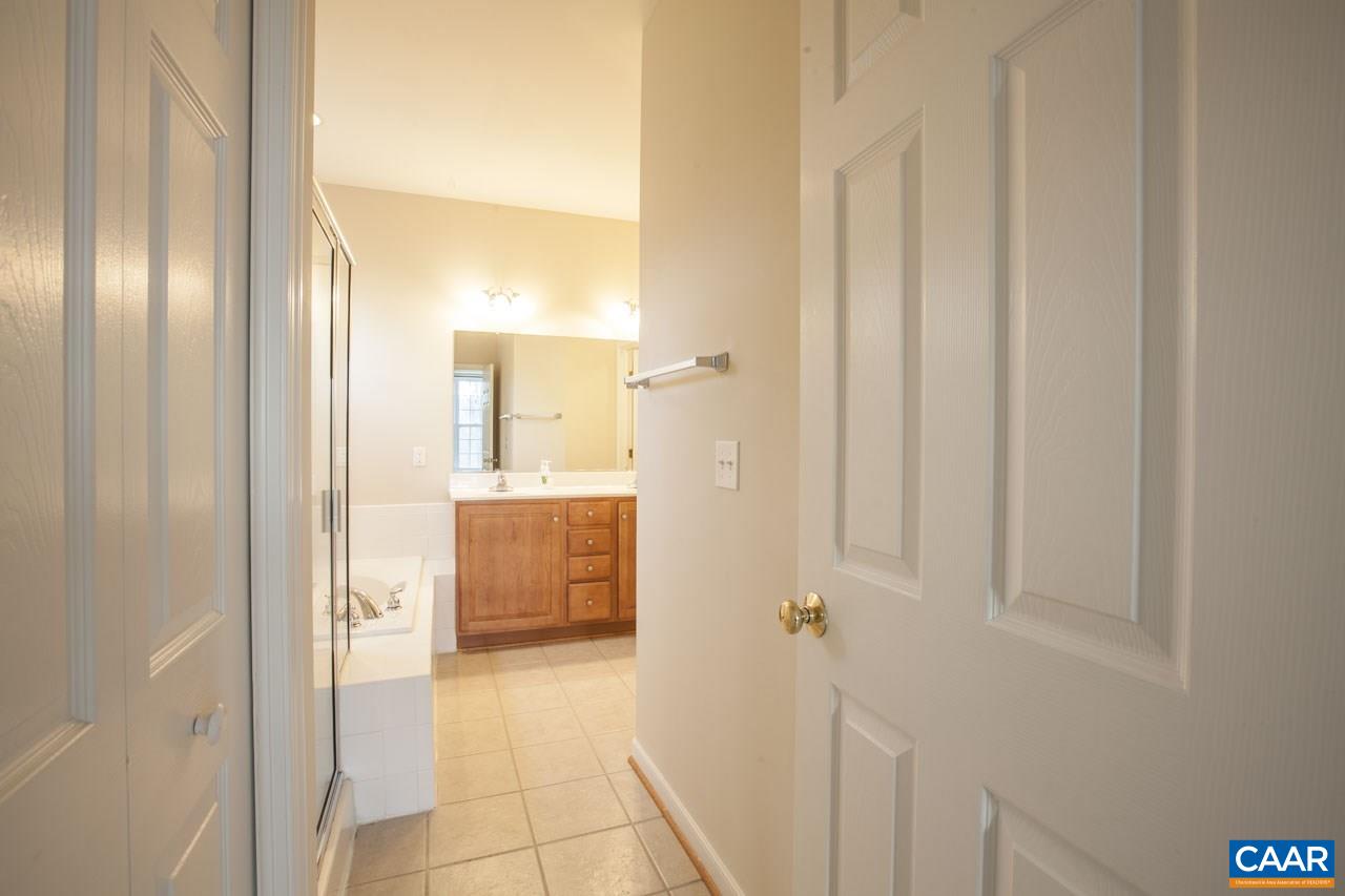 1981 Ridgetop Drive Charlottesville, VA 22903 - Photo 24 of 40 a bathroom with a shower and a sink